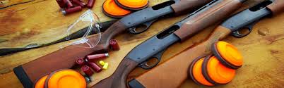 Shotguns, clay pigeons for trap shooting.